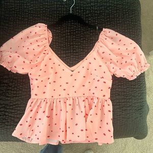 Pink Valentine Peplum Top fromVICI